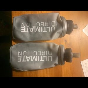 2 Ultimate direction running water bottles plus one insulated bladder bag